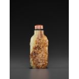 A YELLOW AND RUSSET JADE SNUFF BOTTLE, 'MASTER OF THE ROCKS' SCHOOL, QING DYNASTY