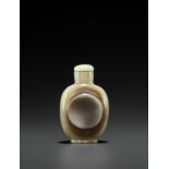 A CELADON JADE 'INTEGRAL DISH' SNUFF BOTTLE, QING DYNASTY