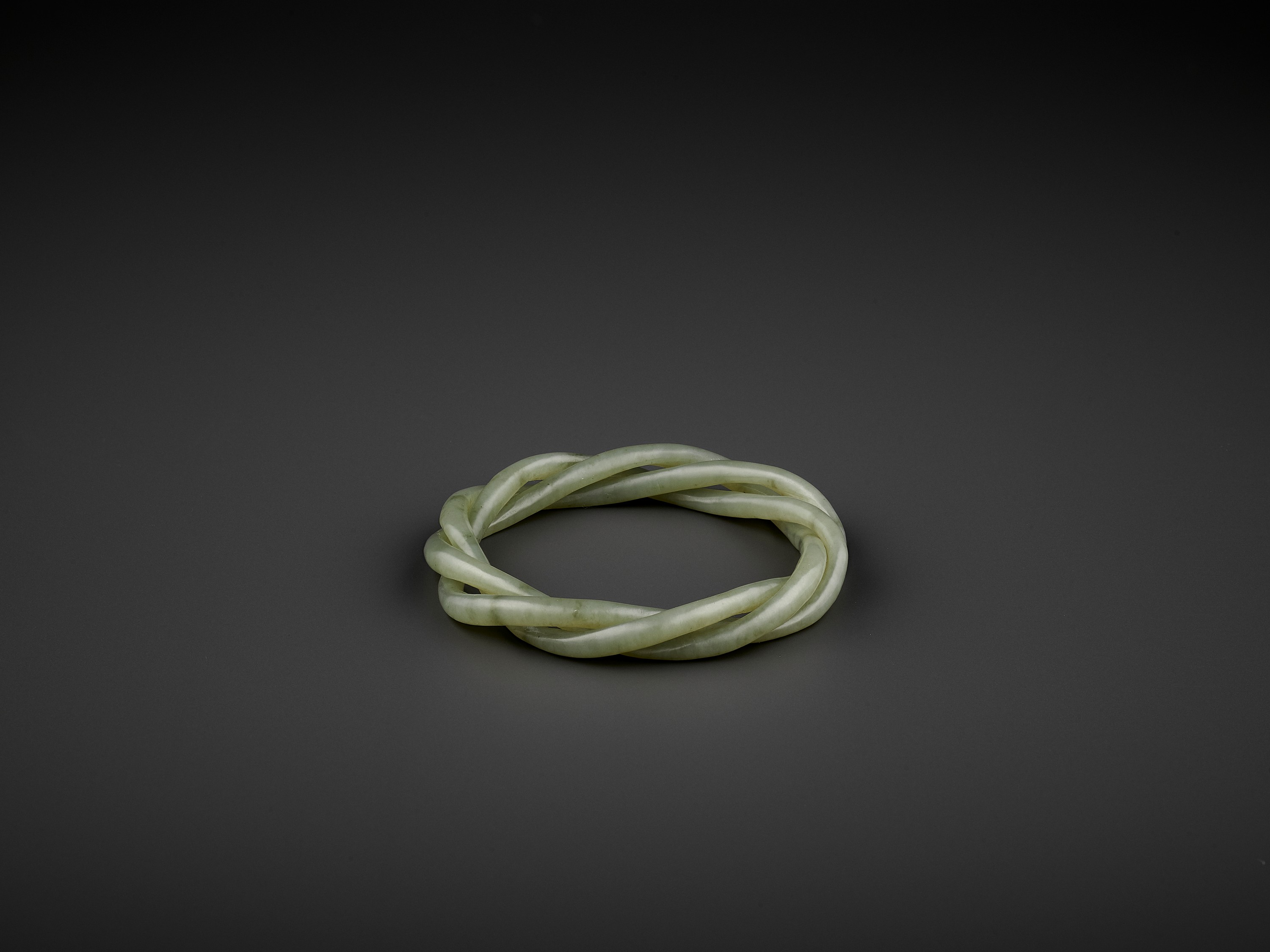 A CELADON JADE ROPE-TWIST BANGLE, QING - Image 3 of 8