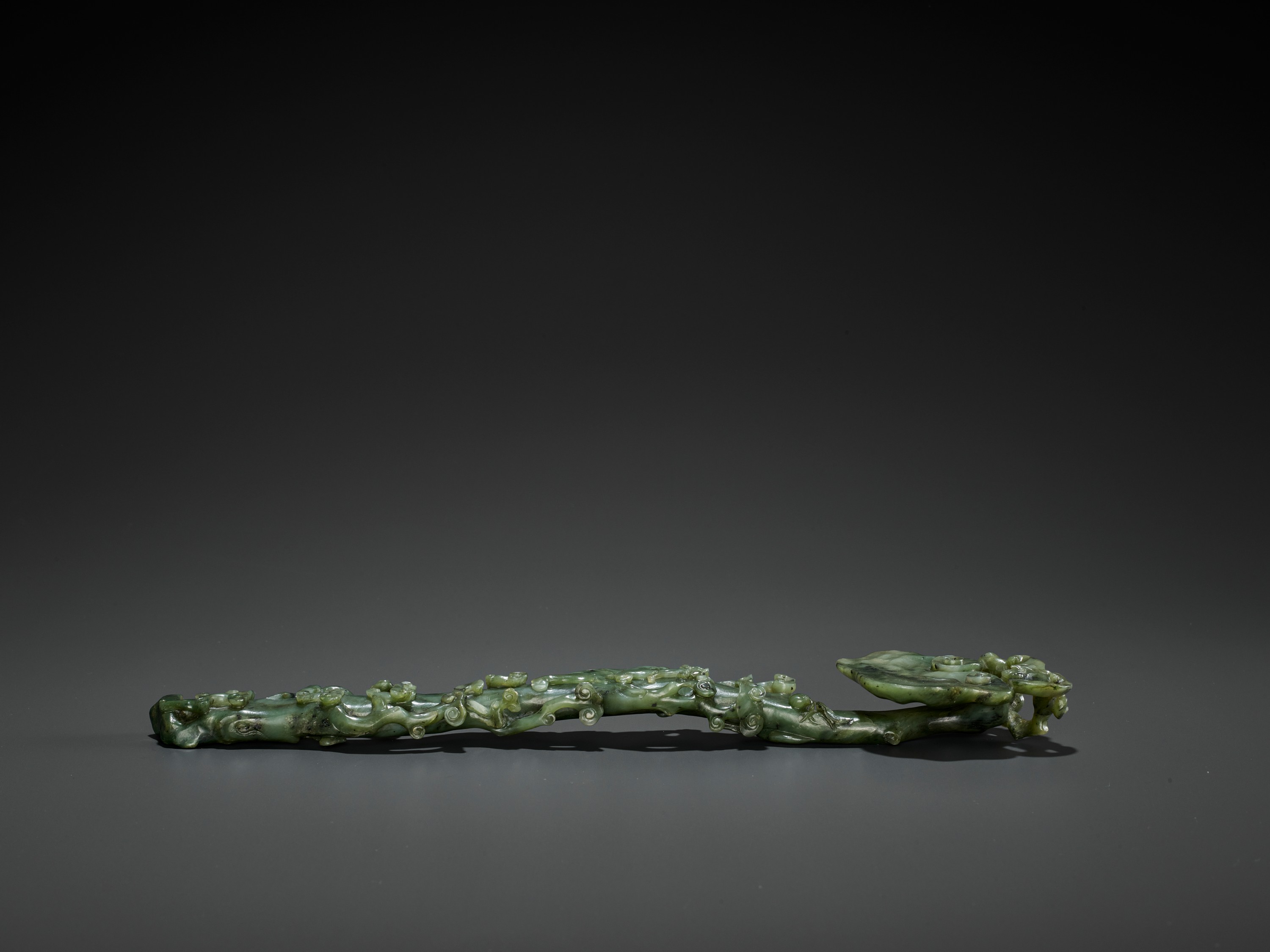 A SPINACH-GREEN JADE RUYI SCEPTER, MID-QING - Image 7 of 15