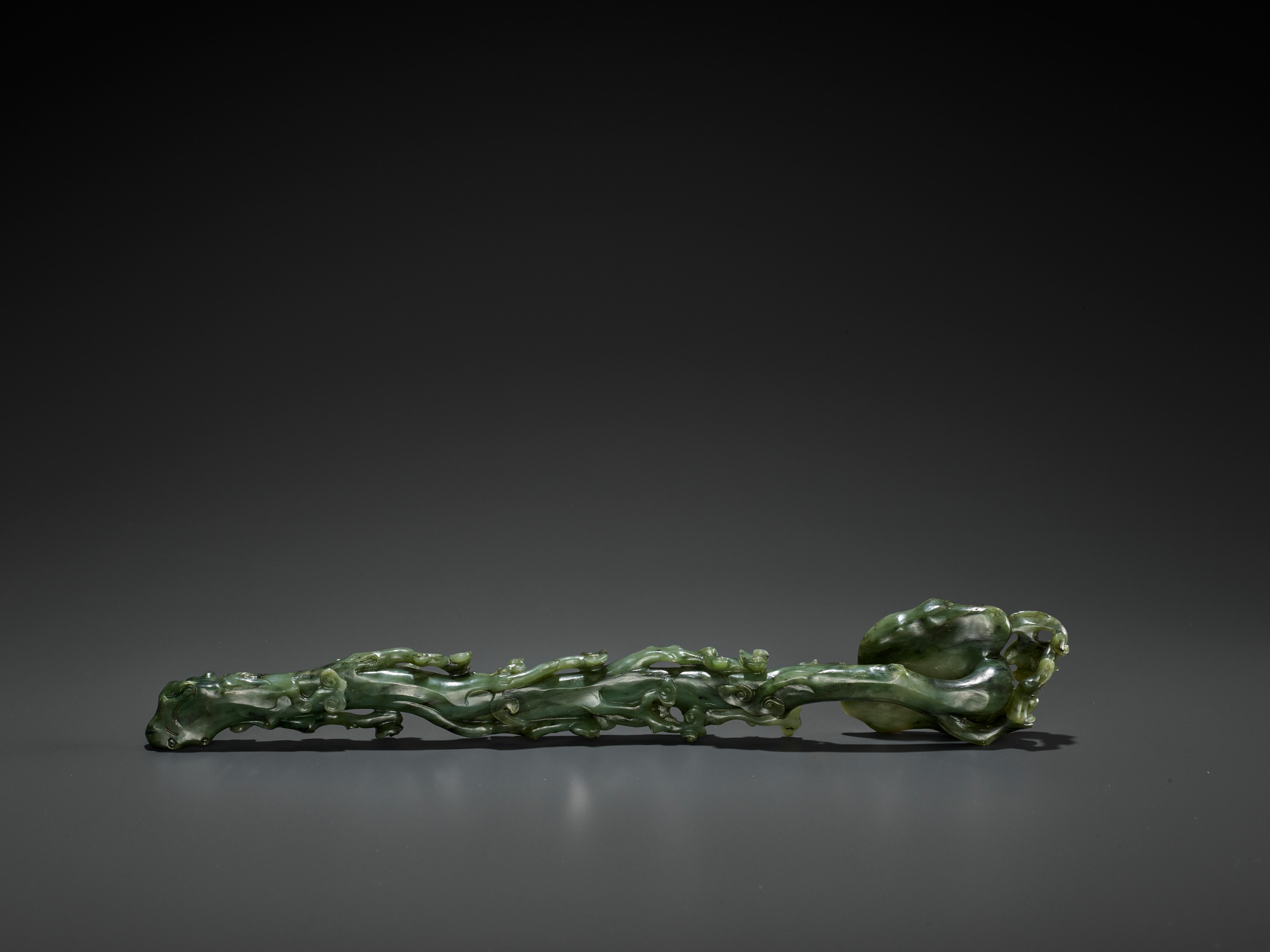 A SPINACH-GREEN JADE RUYI SCEPTER, MID-QING - Image 8 of 15