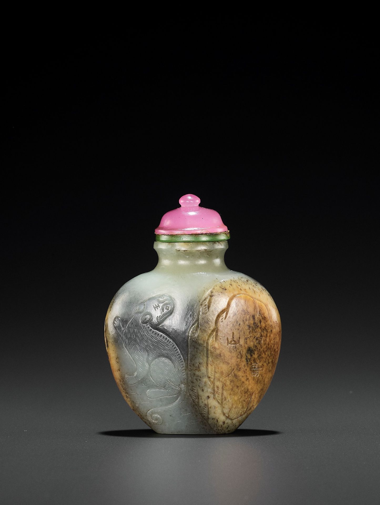 AN INSCRIBED WHITE, GRAY AND RUSSET JADEITE 'TIGER' SNUFF BOTTLE, SIGNATURE OF WANG HENG (1817-1882)