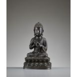 AN EXCEPTIONALLY RARE 'DIAMOND REALM' BUDDHA VAIROCANA BRONZE, MING DYNASTY