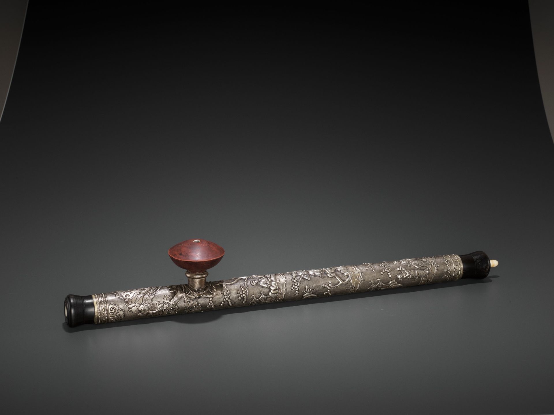 A HARDWOOD OPIUM PIPE WITH BONE, SILVER AND YIXING CERAMIC FITTINGS, LATE QING TO REPUBLIC