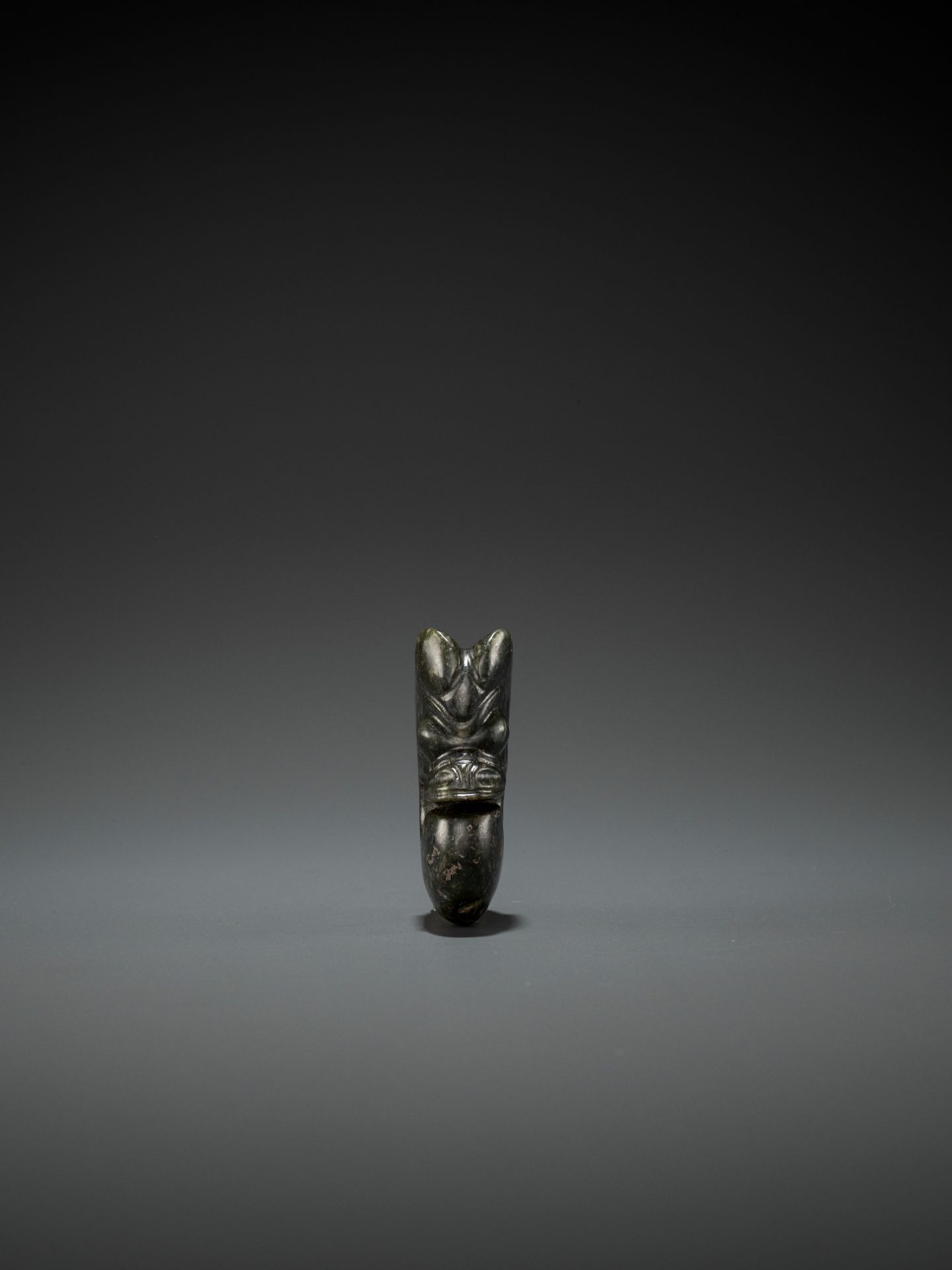 A DARK-GREEN JADE 'PIG-DRAGON' CARVING, ZHULONG, HONGSHAN CULTURE, C. 4000-3000 BC - Image 5 of 6