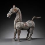 A CARVED AND PAINTED WOOD FIGURE OF A HORSE, YUAN TO EARLY MING DYNASTY