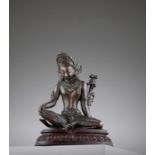 A NEPALESE COPPER FIGURE OF INDRA