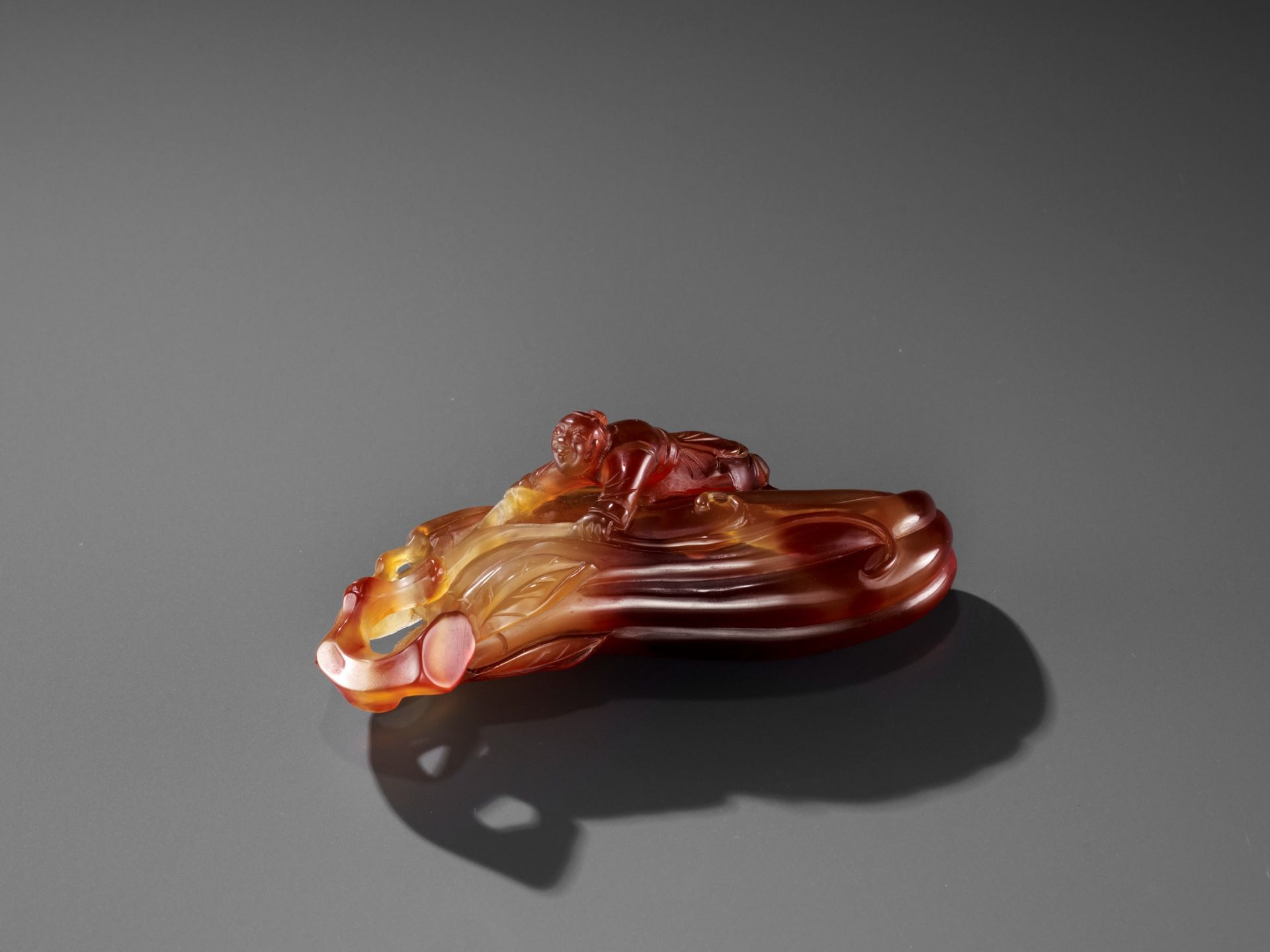 A FINE AGATE 'MELON AND BOY' GROUP, QING