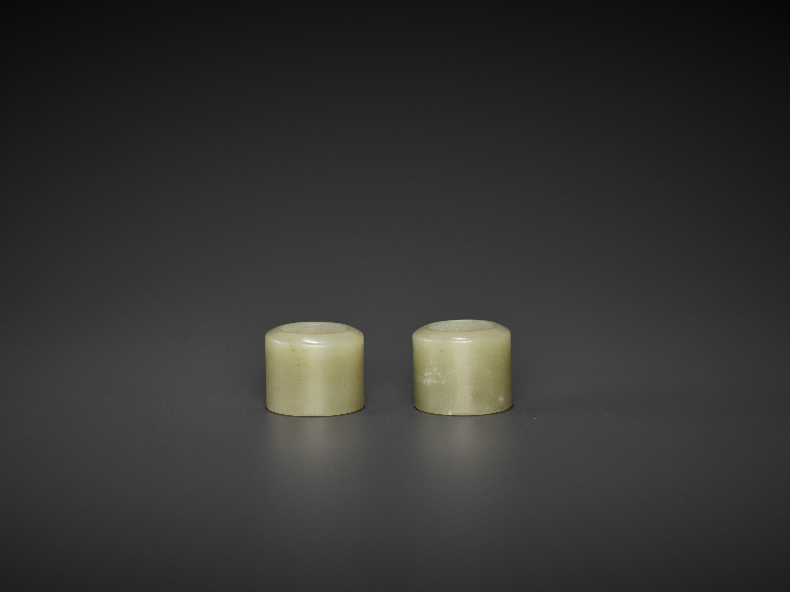 A PAIR OF CELADON JADE ARCHER'S RINGS, QING DYNASTY - Image 6 of 9