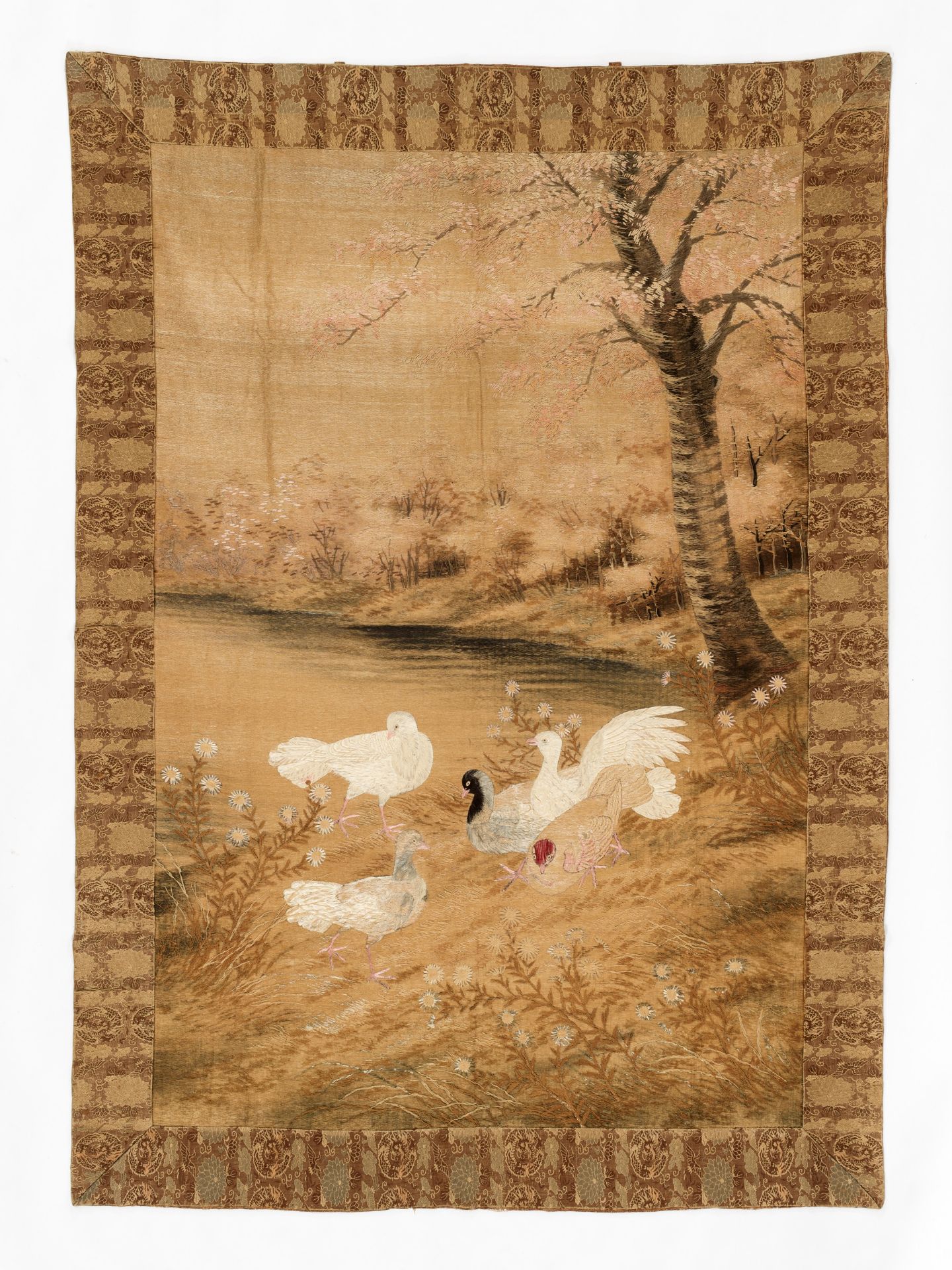 A LARGE EMBROIDERED SILK 'PIGEONS ON A LAKESHORE' WALL HANGING