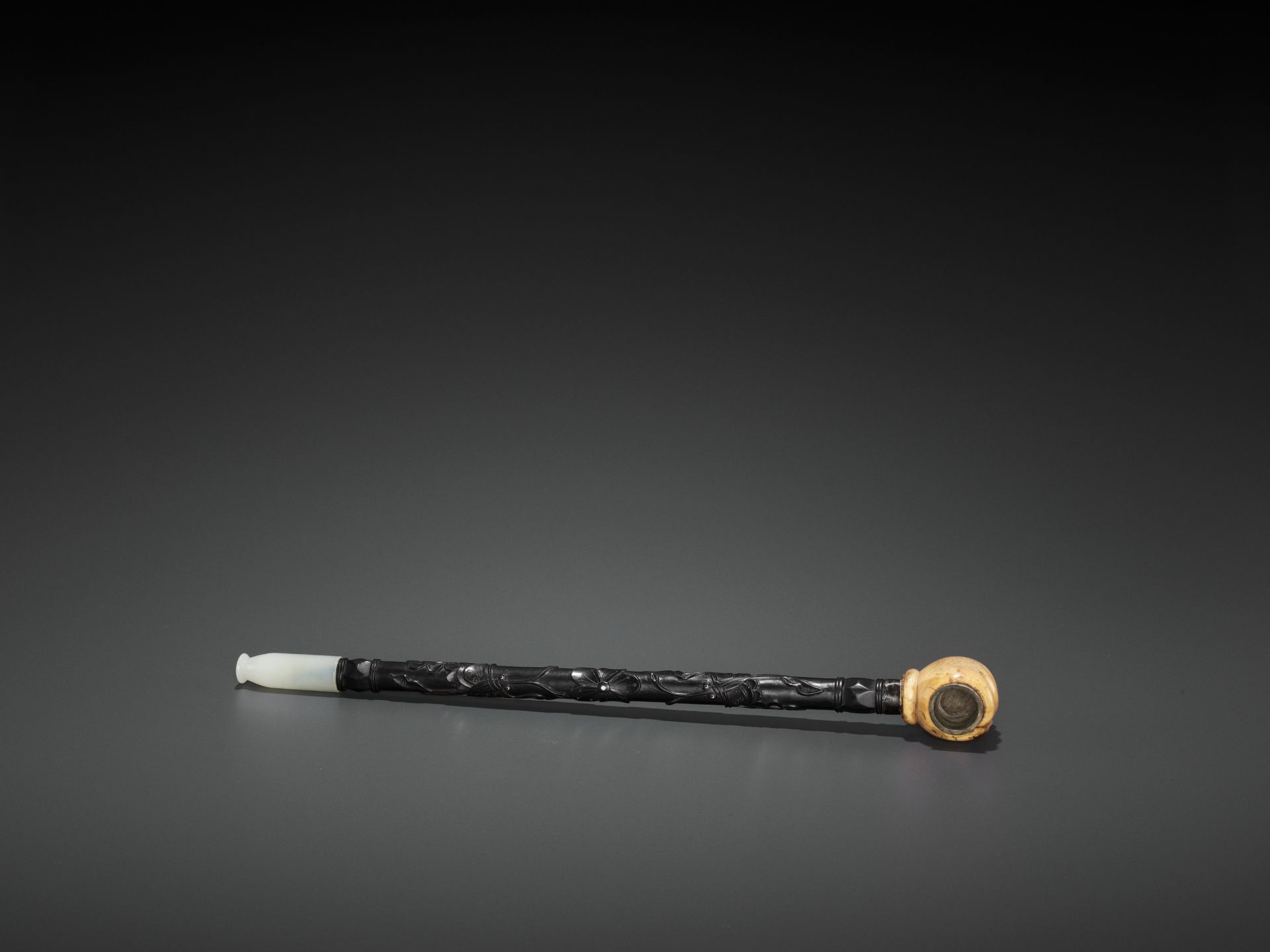 A HARDWOOD OPIUM PIPE WITH JADEITE, IVORY AND ZITAN FITTINGS, LATE QING TO REPUBLIC - Image 5 of 6