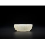 AN IMPERIAL WHITE JADE 'HAITANG' BRUSHWASHER, WITH A POEM BY CHEN YUYI, YONGZHENG MARK AND PERIOD