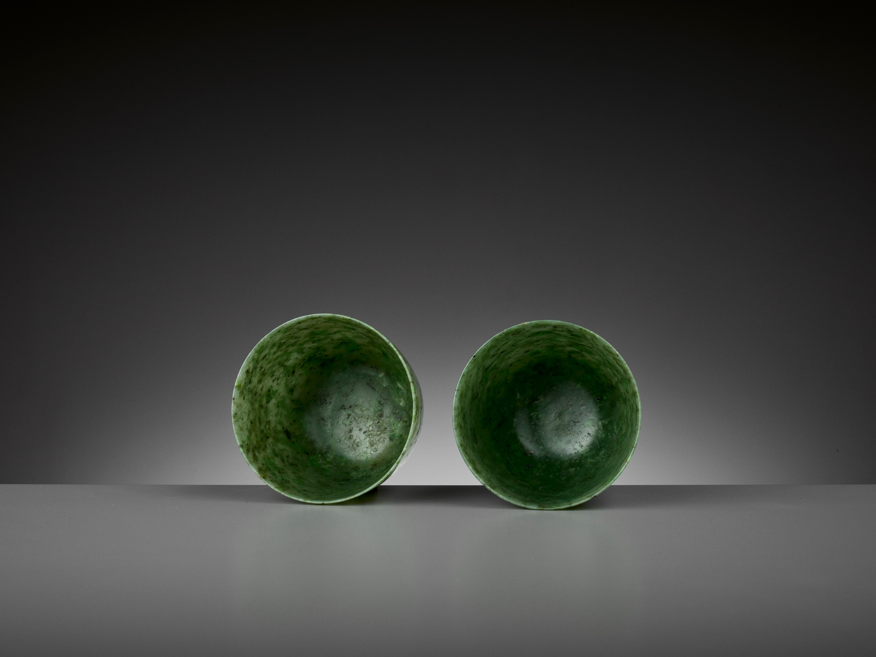 A PAIR OF SPINACH-GREEN JADE CUPS, QING DYNASTY - Image 8 of 8