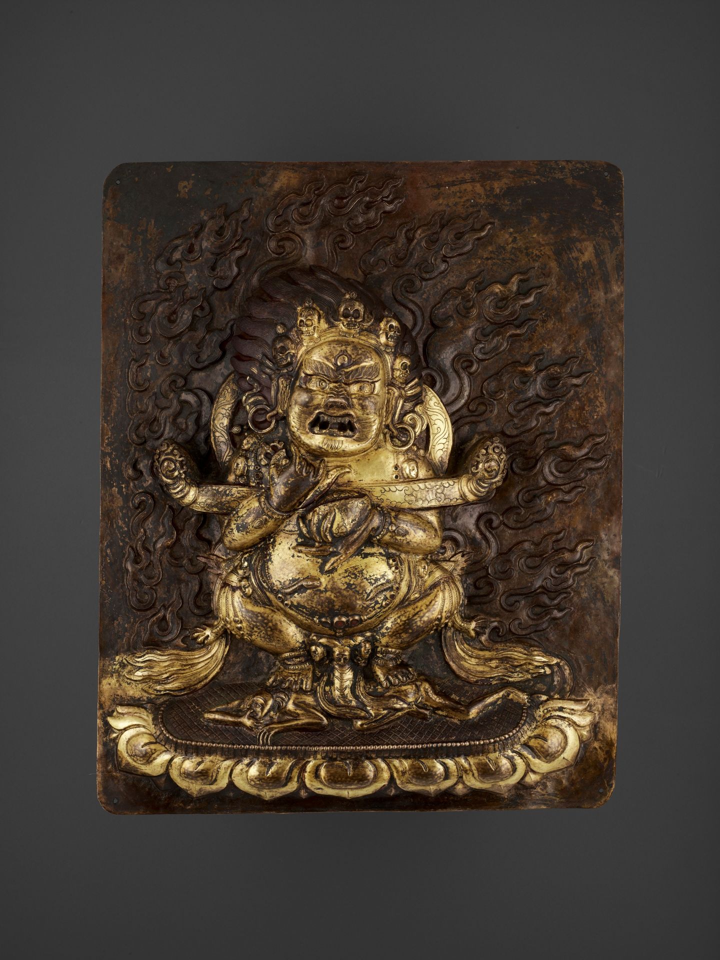 A LARGE GILT-COPPER REPOUSSE RELIEF OF MAHAKALA, 18TH-19TH CENTURY