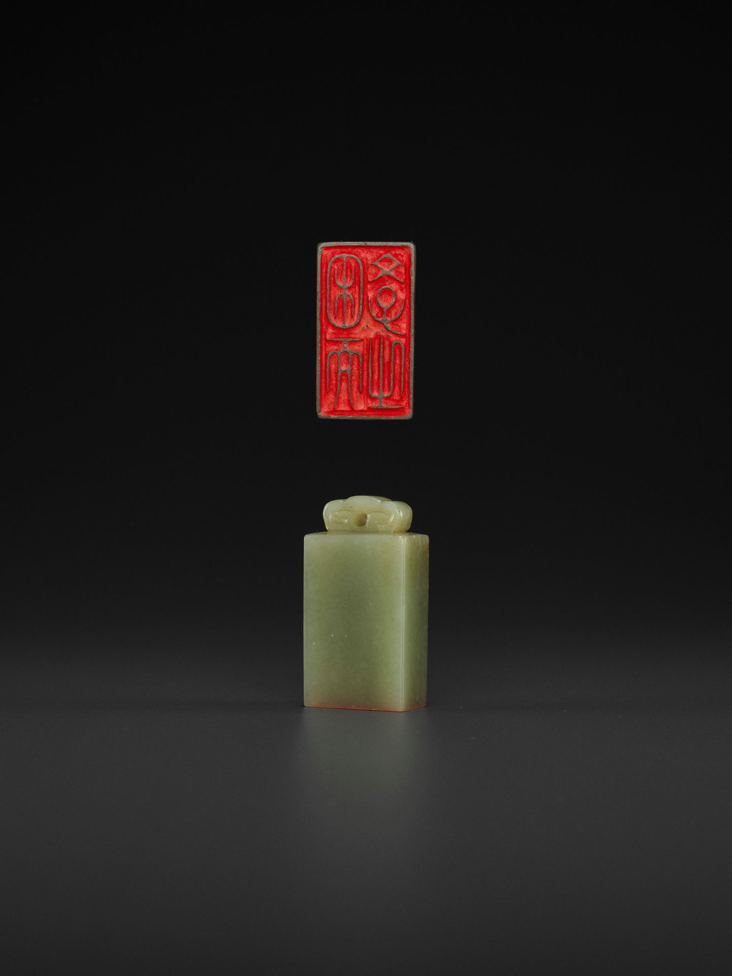 A CELADON AND RUSSET JADE 'LINGZHI' SEAL, MID-QING TO REPUBLIC