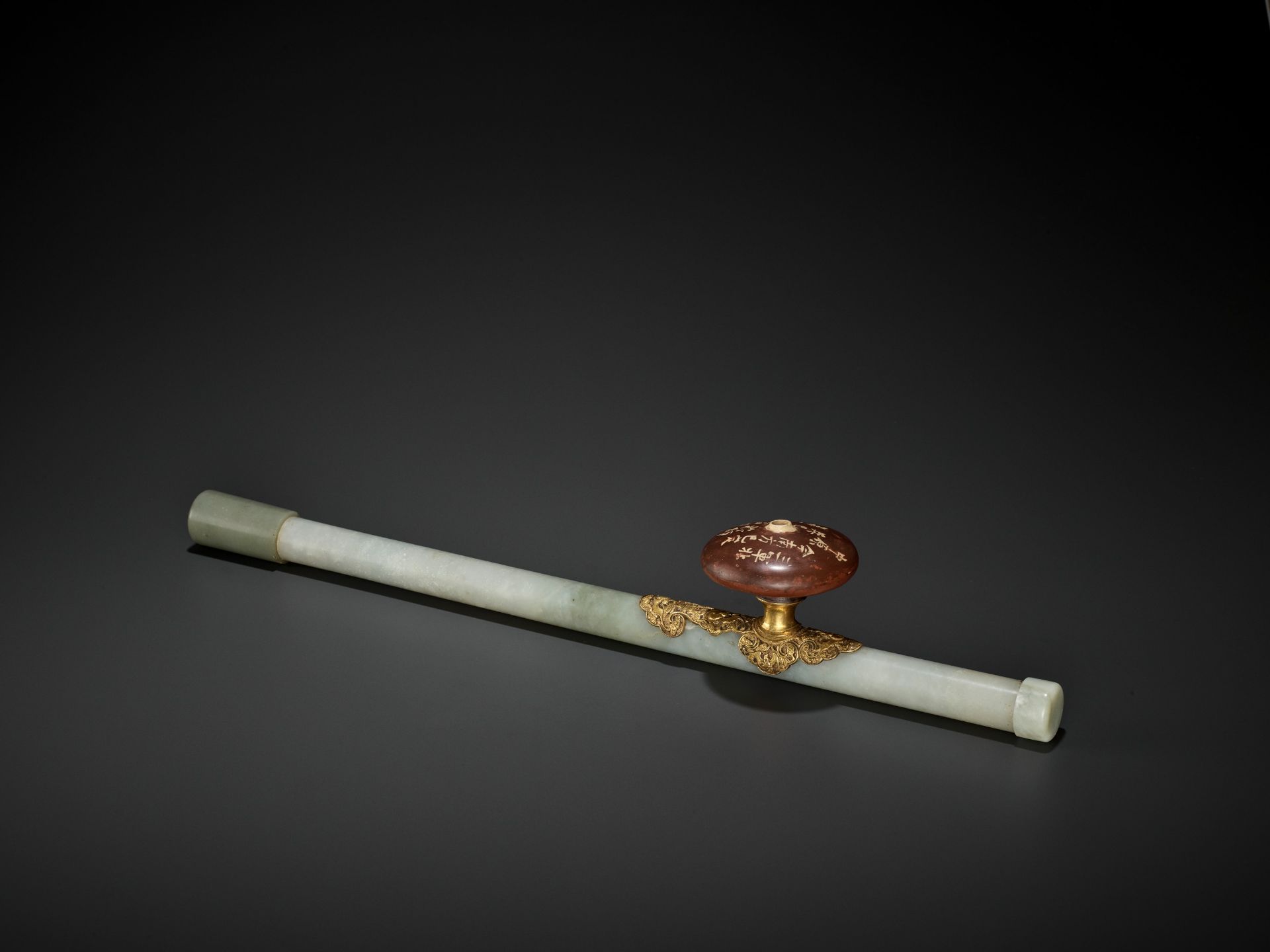 A JADE AND GILT-BRONZE 'WUFU' OPIUM PIPE, QING DYNASTY