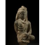 A GRAY SCHIST FIGURE OF A SEATED BUDDHA, GANDHARA, 2ND-3RD CENTURY