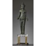 A LARGE AND IMPORTANT BRONZE FIGURE OF AVALOKITESHVARA, ANGKOR WAT PERIOD