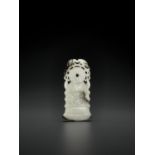 A BLACK AND WHITE JADE 'ARCHAISTIC' AXE-FORM OPENWORK PENDANT, 18 CENTURY