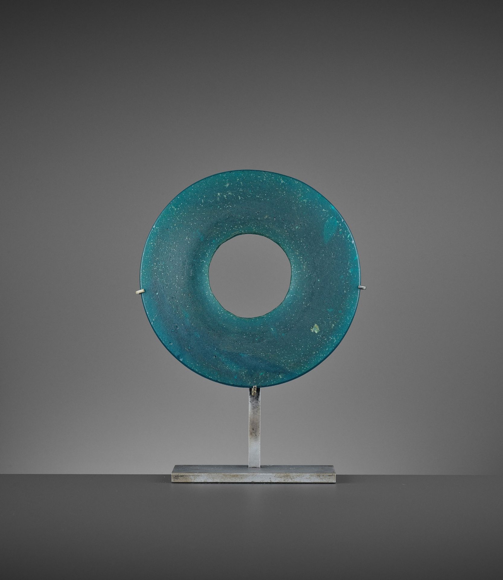 AN AQUAMARINE GREEN GLASS BI DISK, HAN DYNASTY