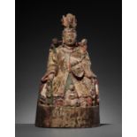 A RARE LACQUERED WOOD STATUE OF SONGZI GUANYIN BREASTFEEDING A CHILD, DATED 1633