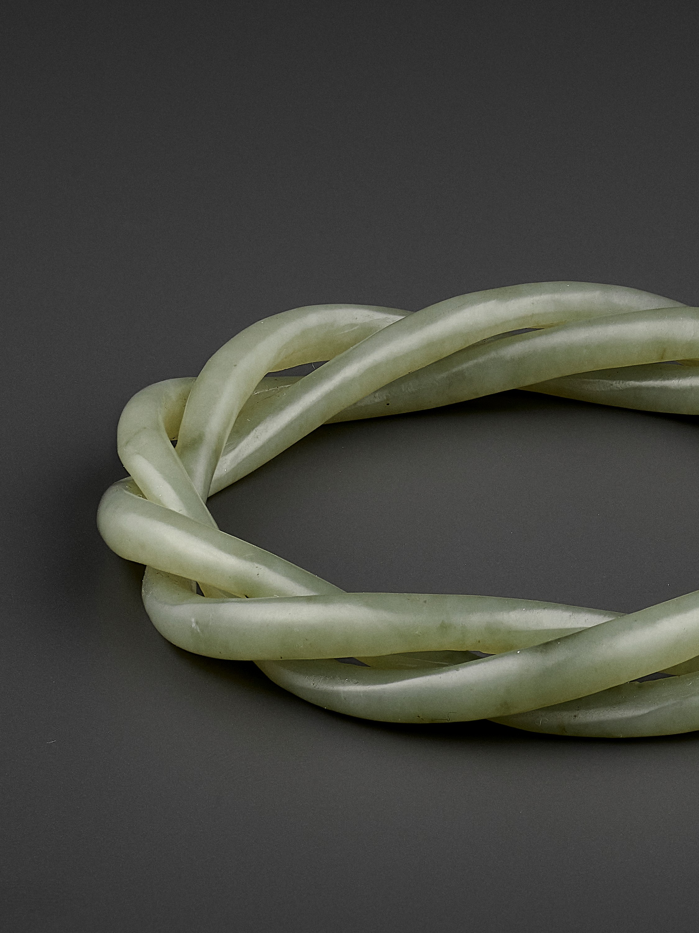 A CELADON JADE ROPE-TWIST BANGLE, QING - Image 2 of 8