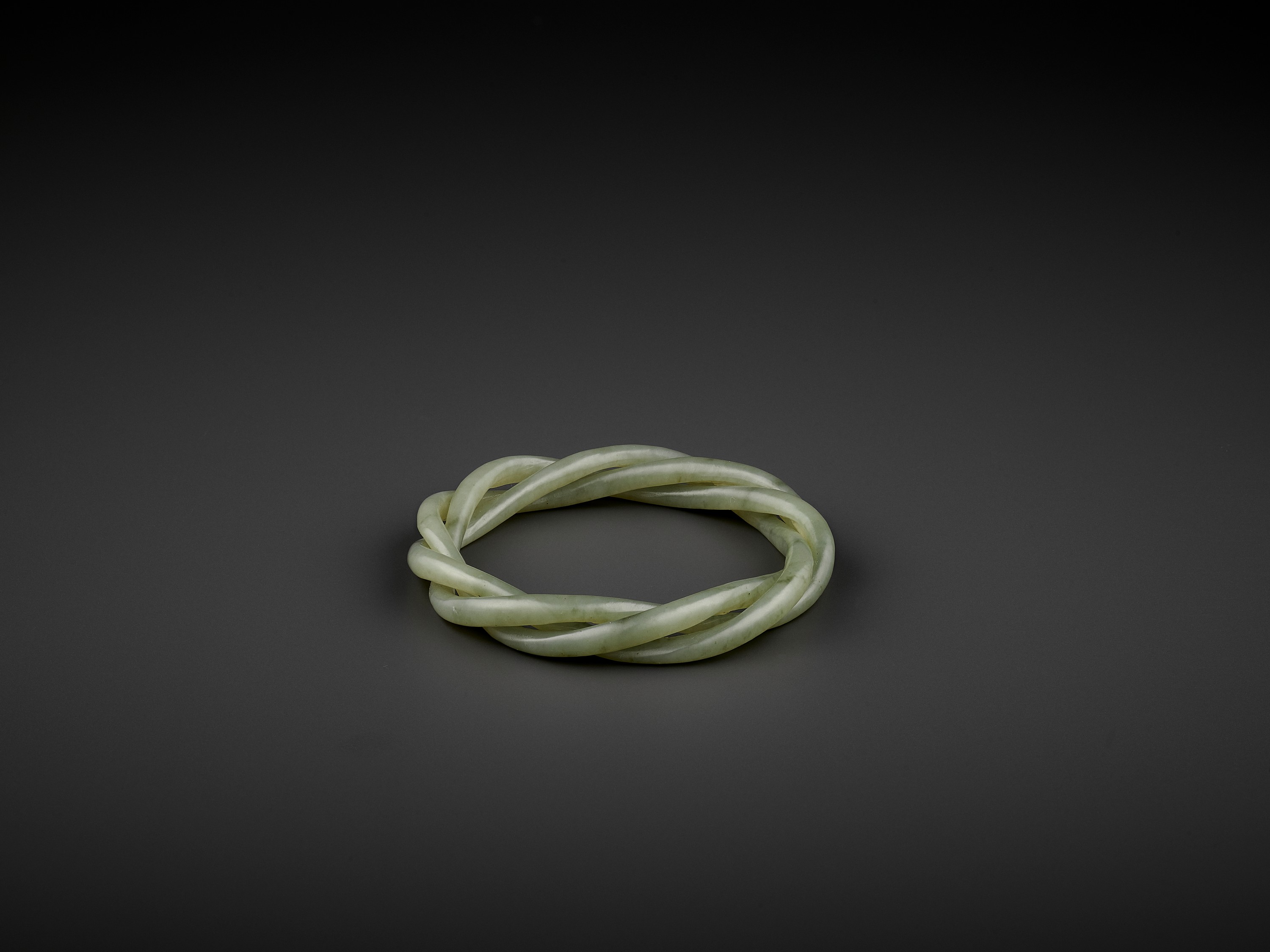 A CELADON JADE ROPE-TWIST BANGLE, QING - Image 5 of 8