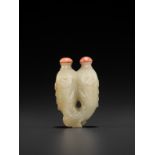 A CELADON JADE 'DOUBLE FISH' SNUFF BOTTLE, QING DYNASTY