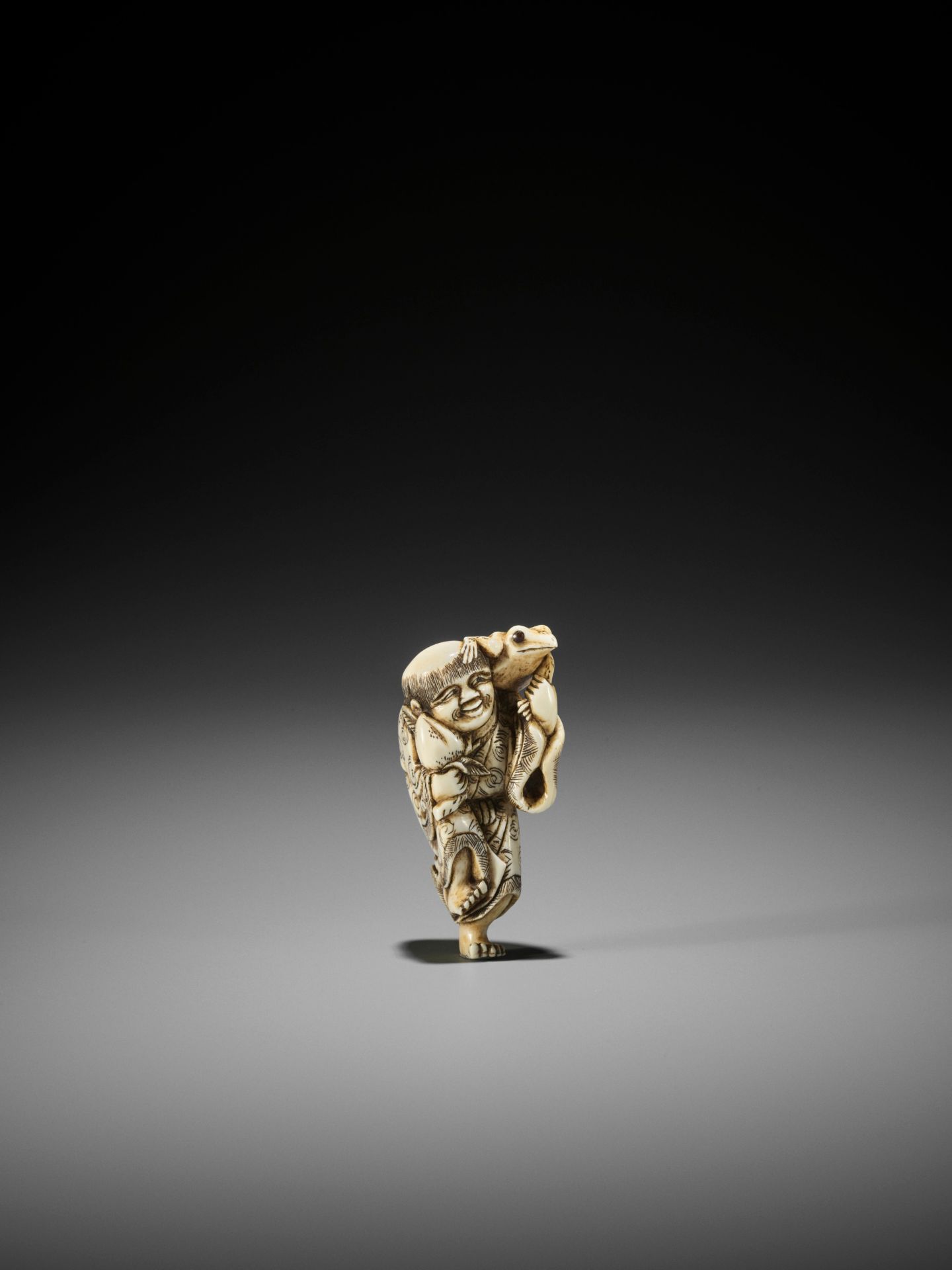 YOSHINAGA: AN IVORY NETSUKE OF GAMA SENNIN WITH A PEACH AND HIS THREE-LEGGED TOAD - Image 3 of 11
