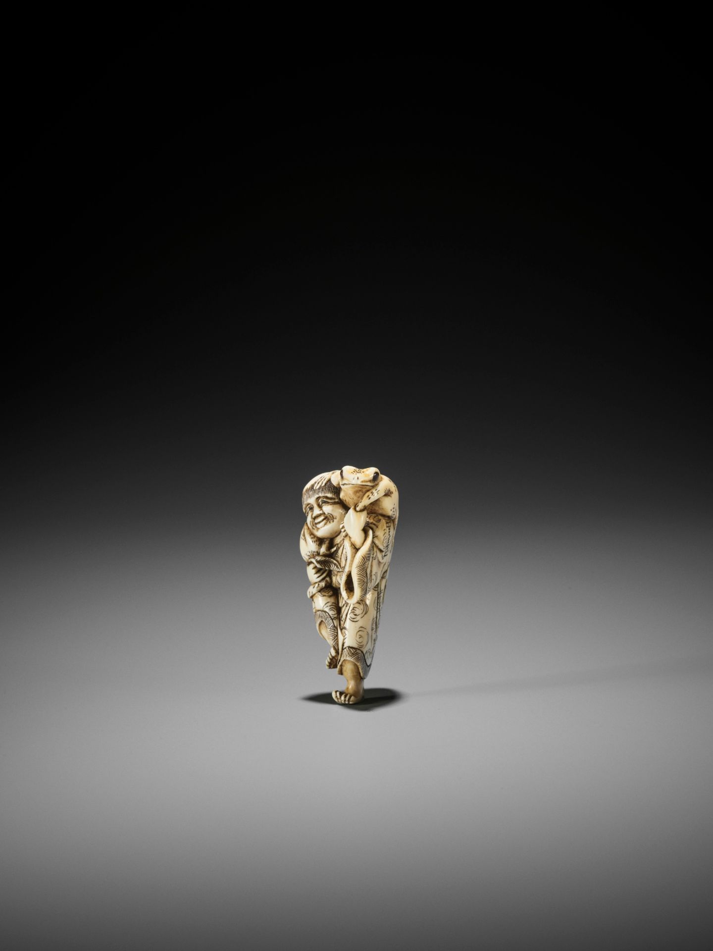 YOSHINAGA: AN IVORY NETSUKE OF GAMA SENNIN WITH A PEACH AND HIS THREE-LEGGED TOAD - Image 7 of 11