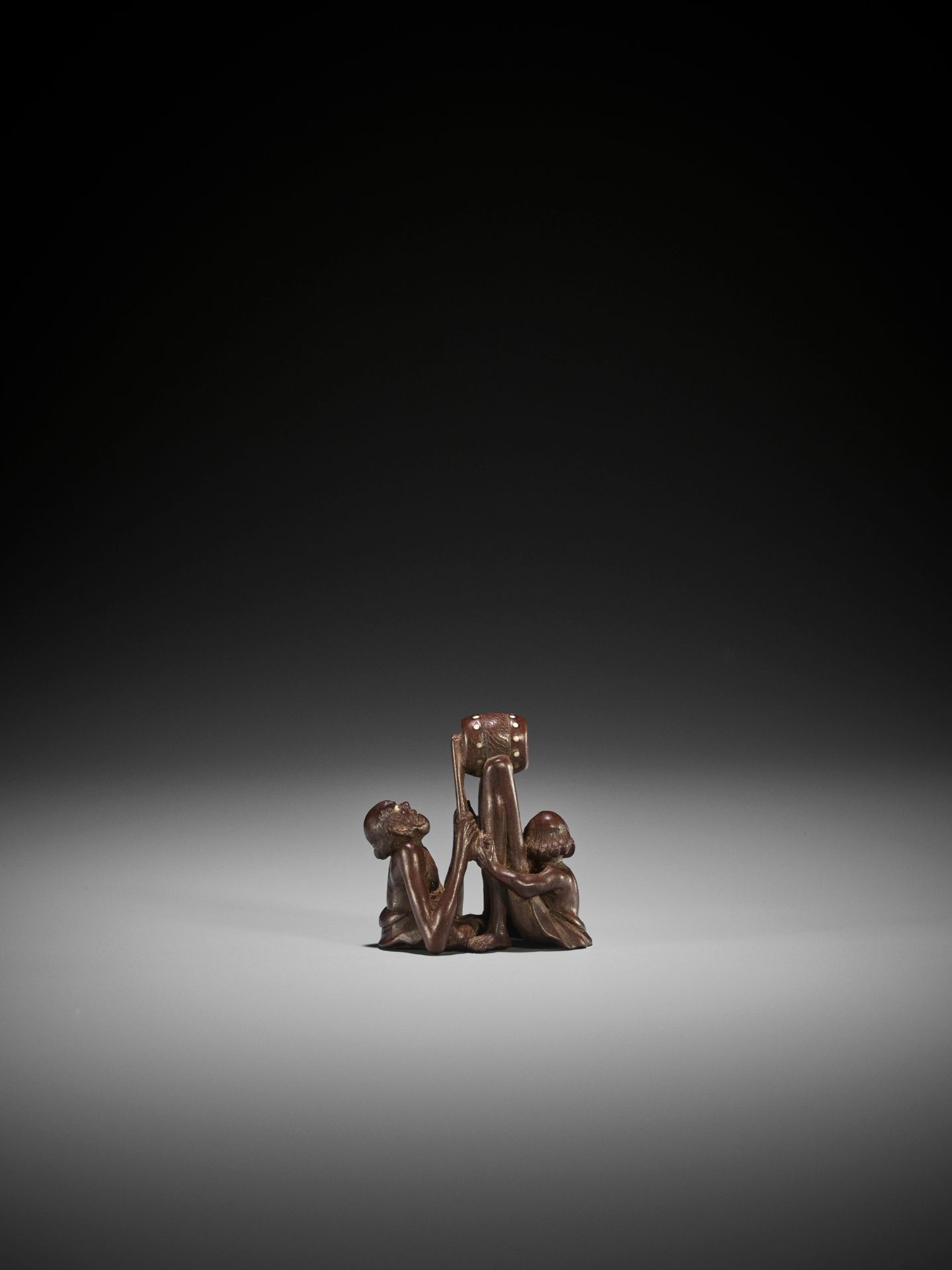 RAKUMIN: AN AMUSING WOOD NETSUKE OF ASHINAGA AND TENAGA PLAYING A DRUM - Image 3 of 11
