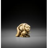 TOMOTADA: AN EXCEPTIONAL IVORY NETSUKE OF A TIGRESS AND CUB
