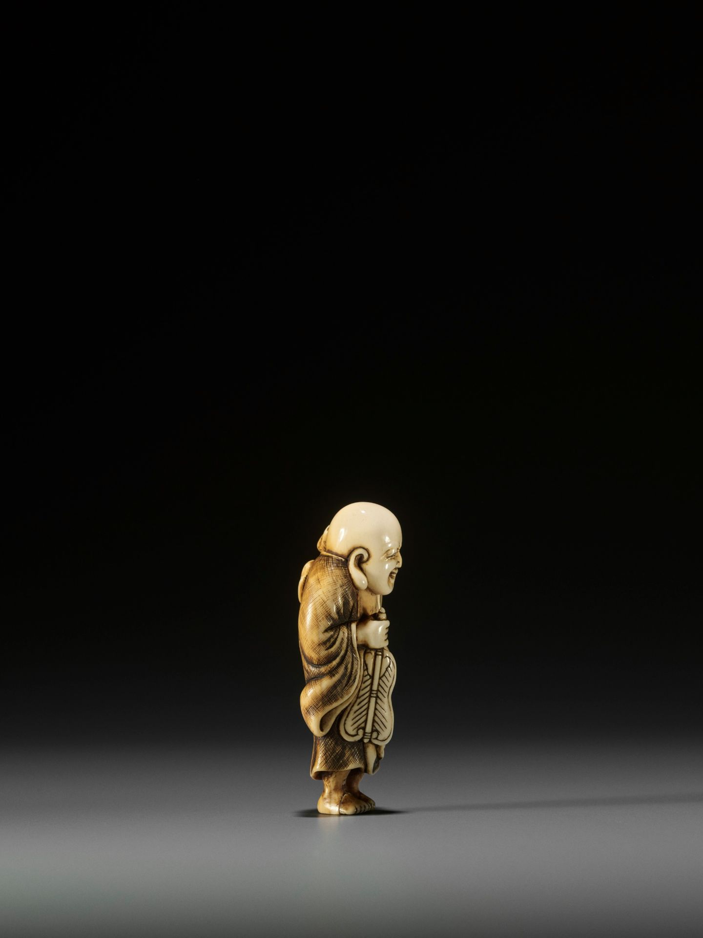 OKAKOTO: AN IVORY NETSUKE OF HOTEI WITH KARAKO - Image 5 of 10