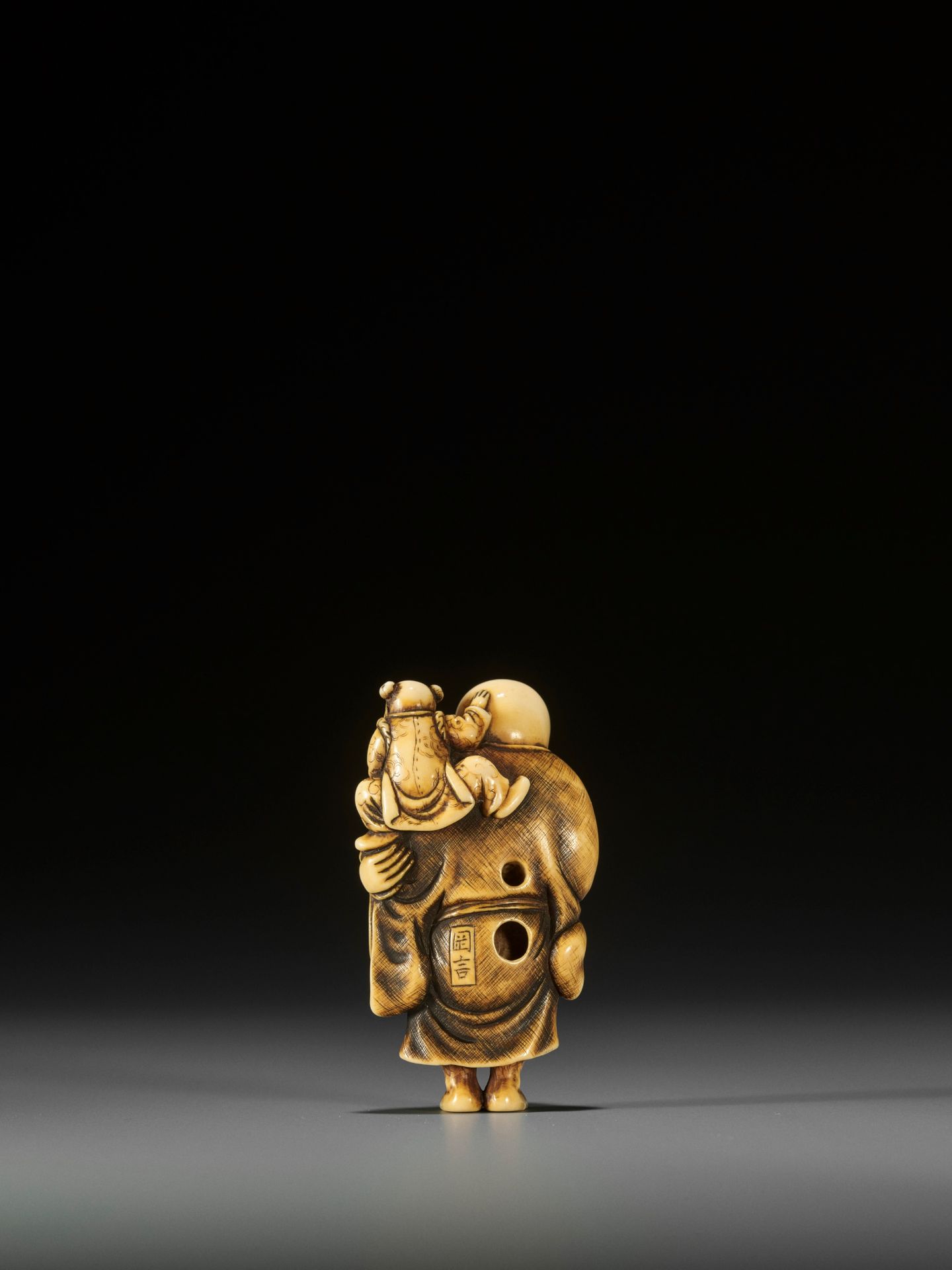 OKAKOTO: AN IVORY NETSUKE OF HOTEI WITH KARAKO - Image 2 of 10