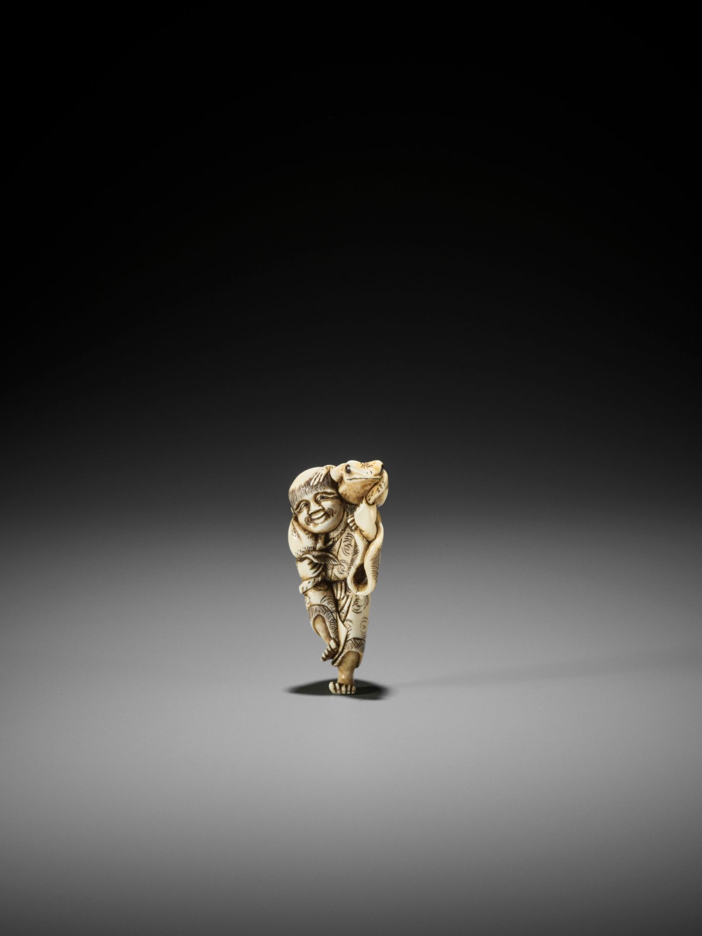 YOSHINAGA: AN IVORY NETSUKE OF GAMA SENNIN WITH A PEACH AND HIS THREE-LEGGED TOAD - Image 6 of 11