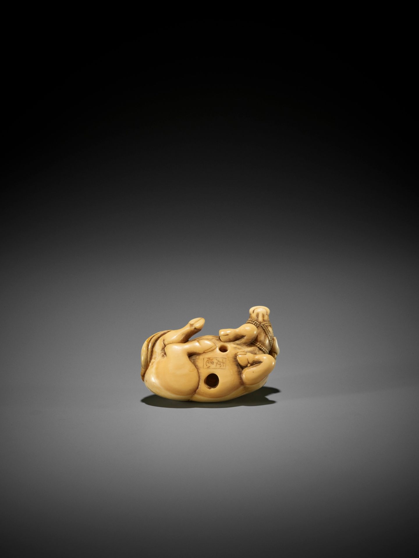 TOMOTADA: AN IVORY NETSUKE OF A RECUMBENT OX - Image 2 of 11