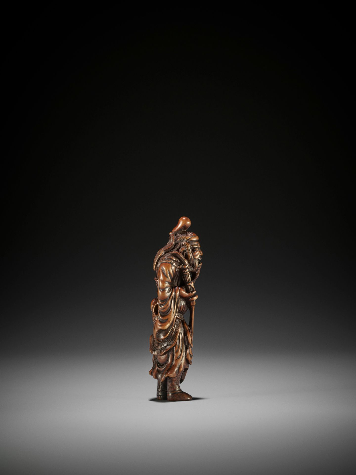 A SUPERB AND TALL WOOD NETSUKE OF SHOKI - Image 6 of 8