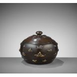 AN IMPRESSIVE BRONZE JAR AND COVER INLAID WITH MANY FINE MENUKI