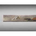 OMORI TERUMITSU: AN INLAID SILVER KOZUKA WITH A FLYING CRANE AND RISING SUN