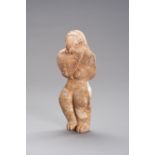 AN INDUS VALLEY STYLE STONE FIGURE OF A FERTILITY GODDESS