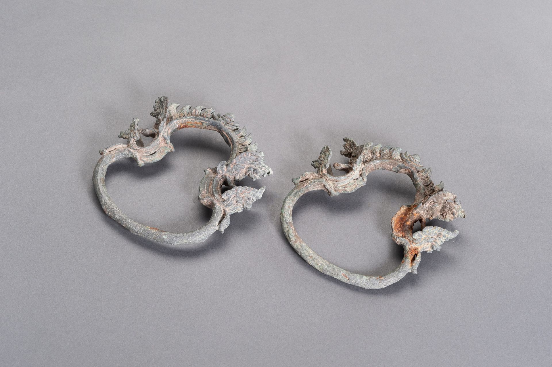 A PAIR OF KHMER BRONZE PALANQUIN RINGS