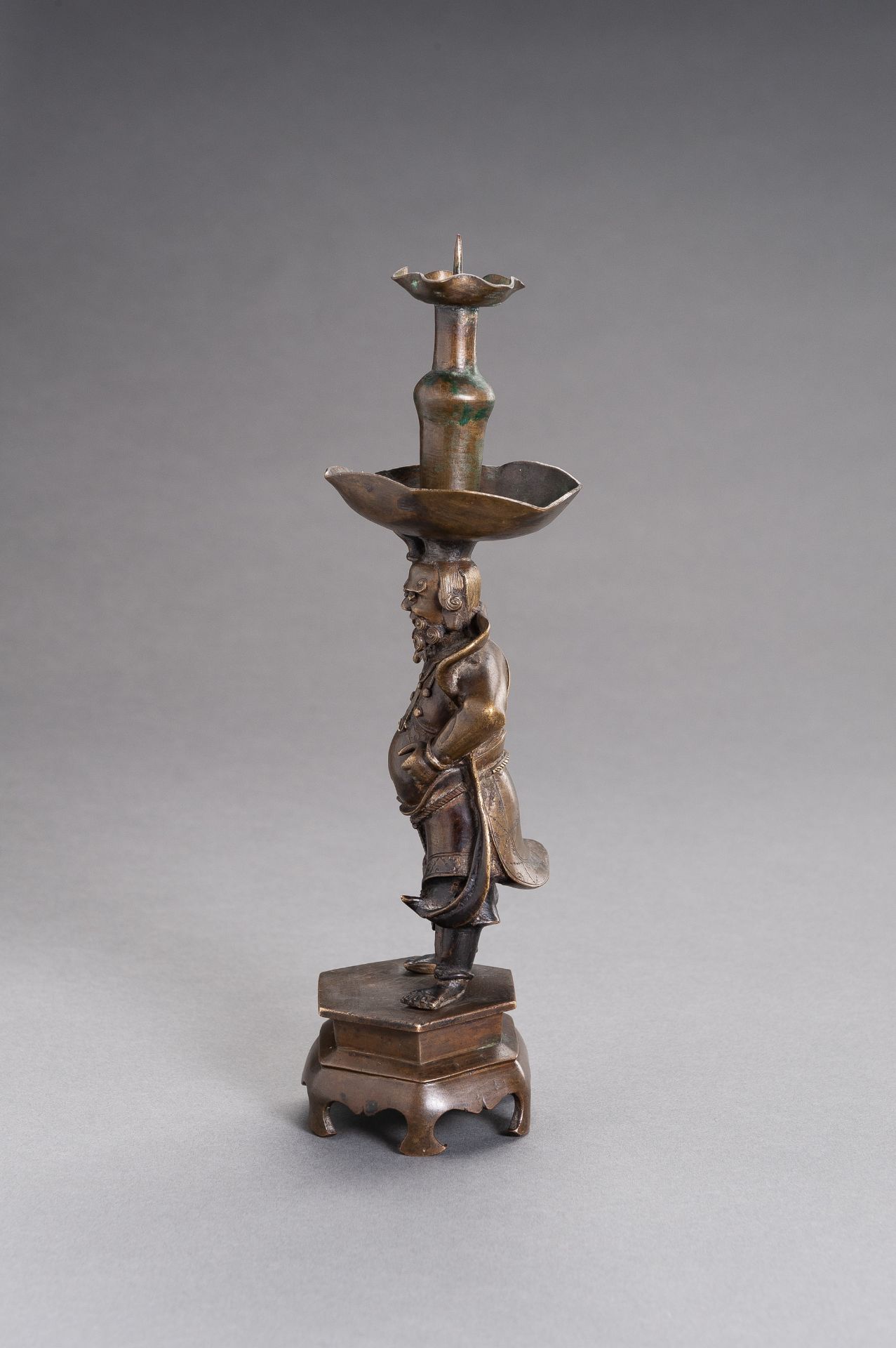 A BRONZE 'FOREIGNER' CANDLESTICK - Image 5 of 7