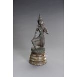 A BRONZE FIGURE OF A DANCING APSARA