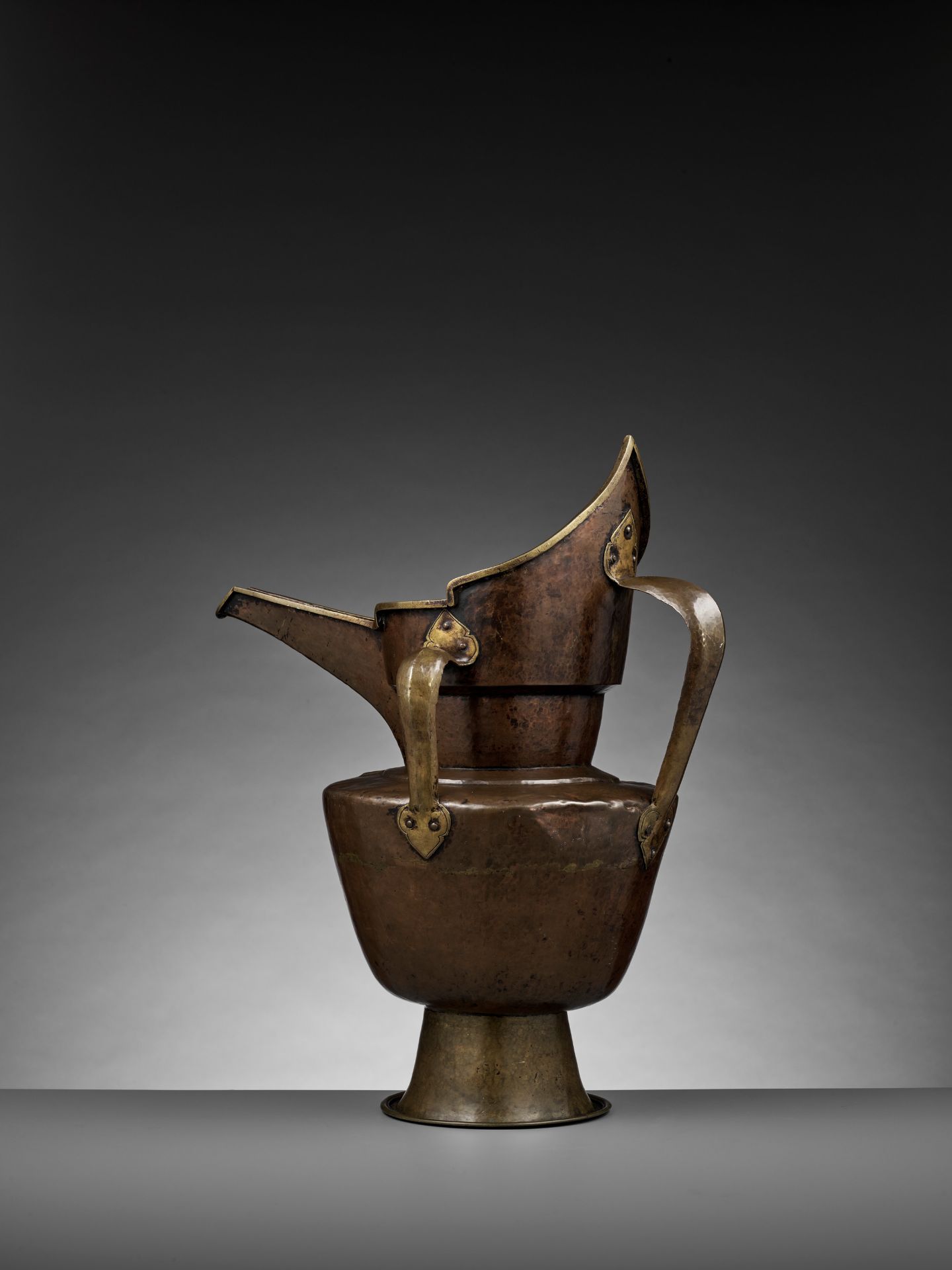 A TIBETAN-CHINESE PARCEL-GILT BRONZE 'MONK'S CAP' EWER, SENGMAOHU - Image 10 of 17