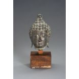 A SUKHOTHAI SYTLE BRONZE HEAD OF BUDDHA