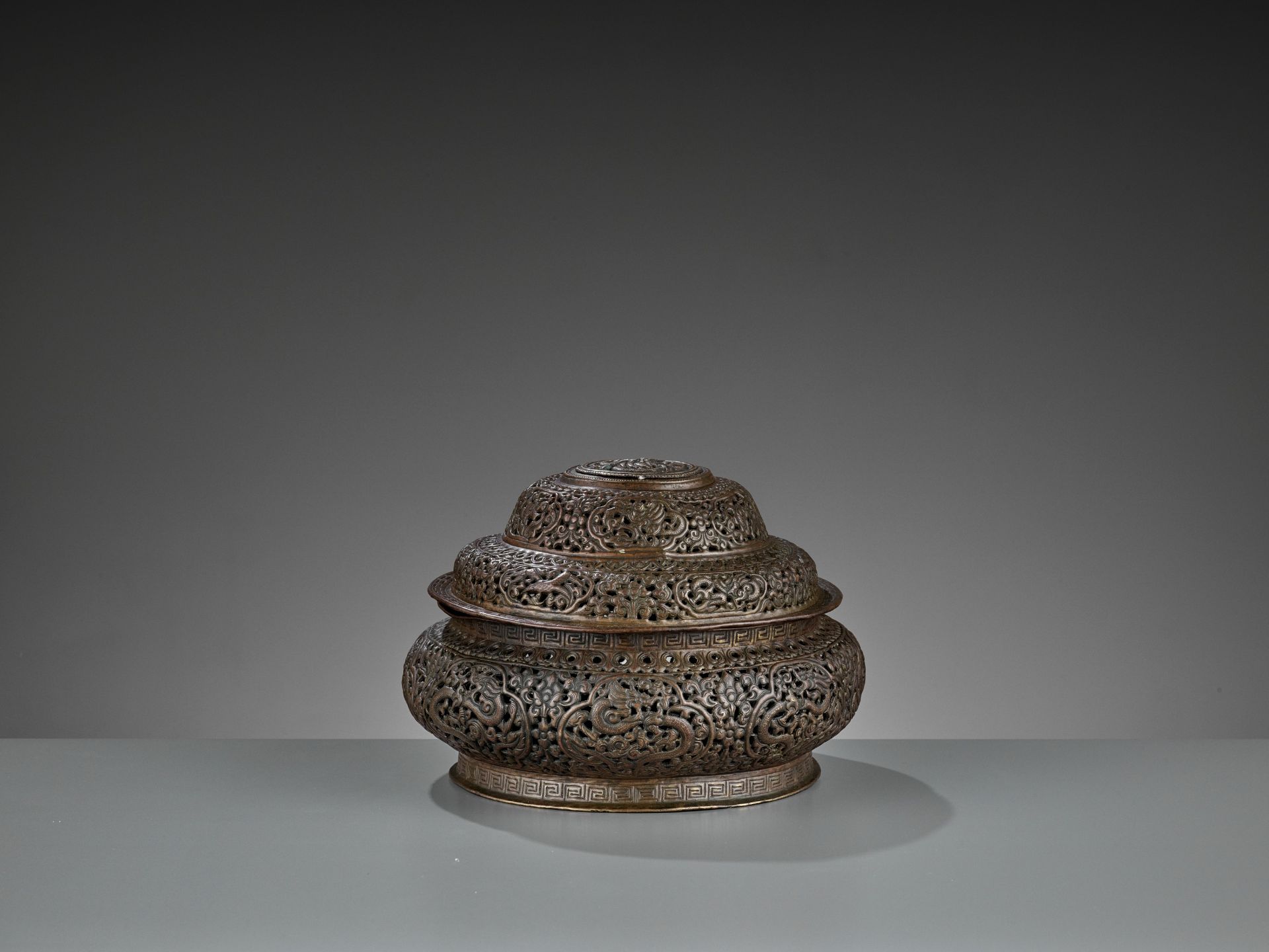 AN OPENWORK COPPER-REPOUSSE CENSER AND COVER, LATE MING TO EARLY QING - Image 4 of 9