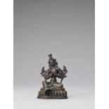 A NEPALESE BRONZE FIGURE OF GREEN TARA, 18TH-19TH CENTURY