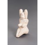A STONE INDUS VALLEY STYLE FIGURE OF A FERTILITY GODDESS