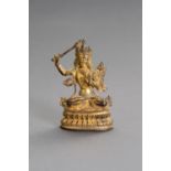 A GILT BRONZE FIGURE OF MANJUSHRI