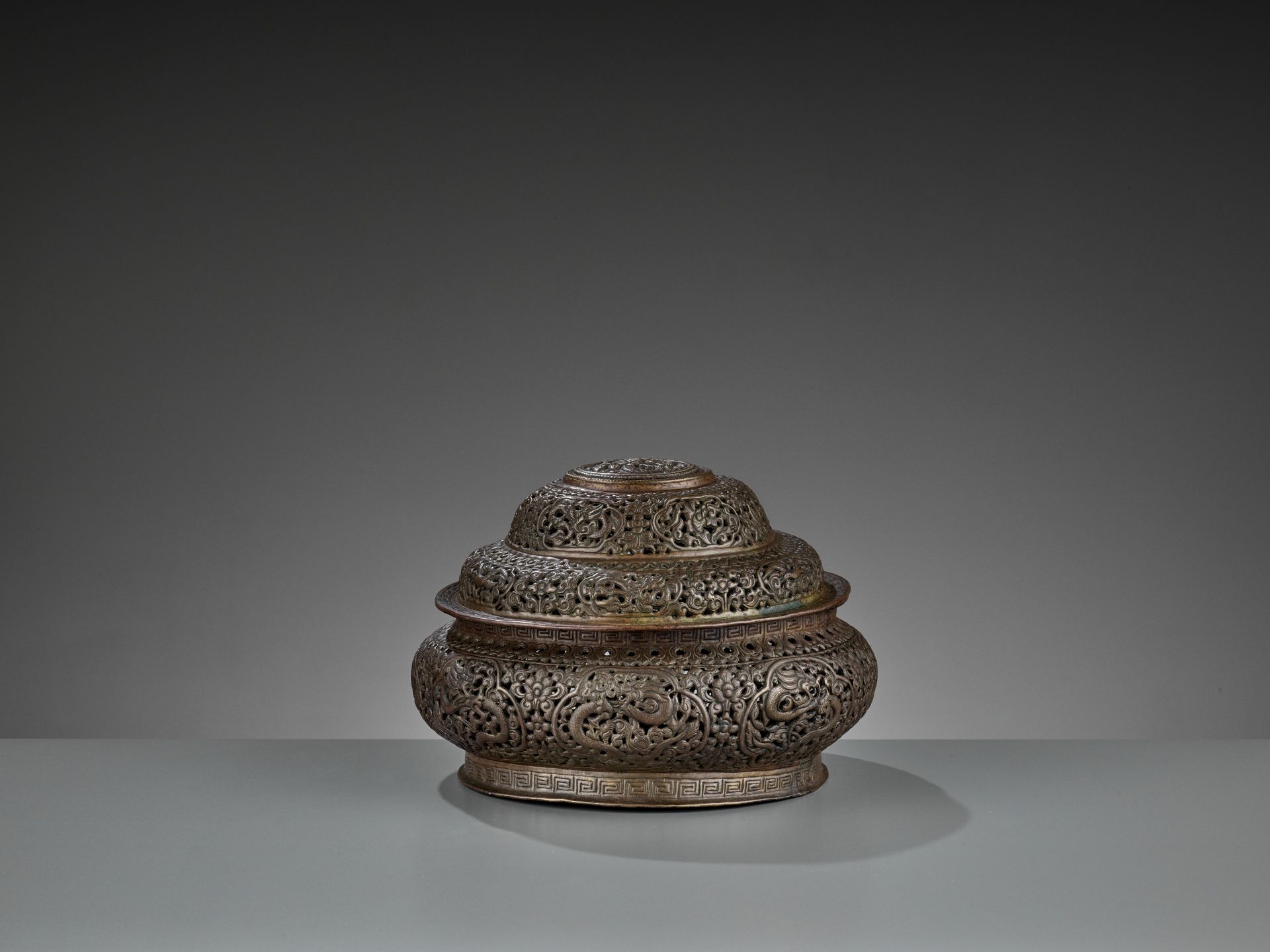 AN OPENWORK COPPER-REPOUSSE CENSER AND COVER, LATE MING TO EARLY QING - Image 8 of 9